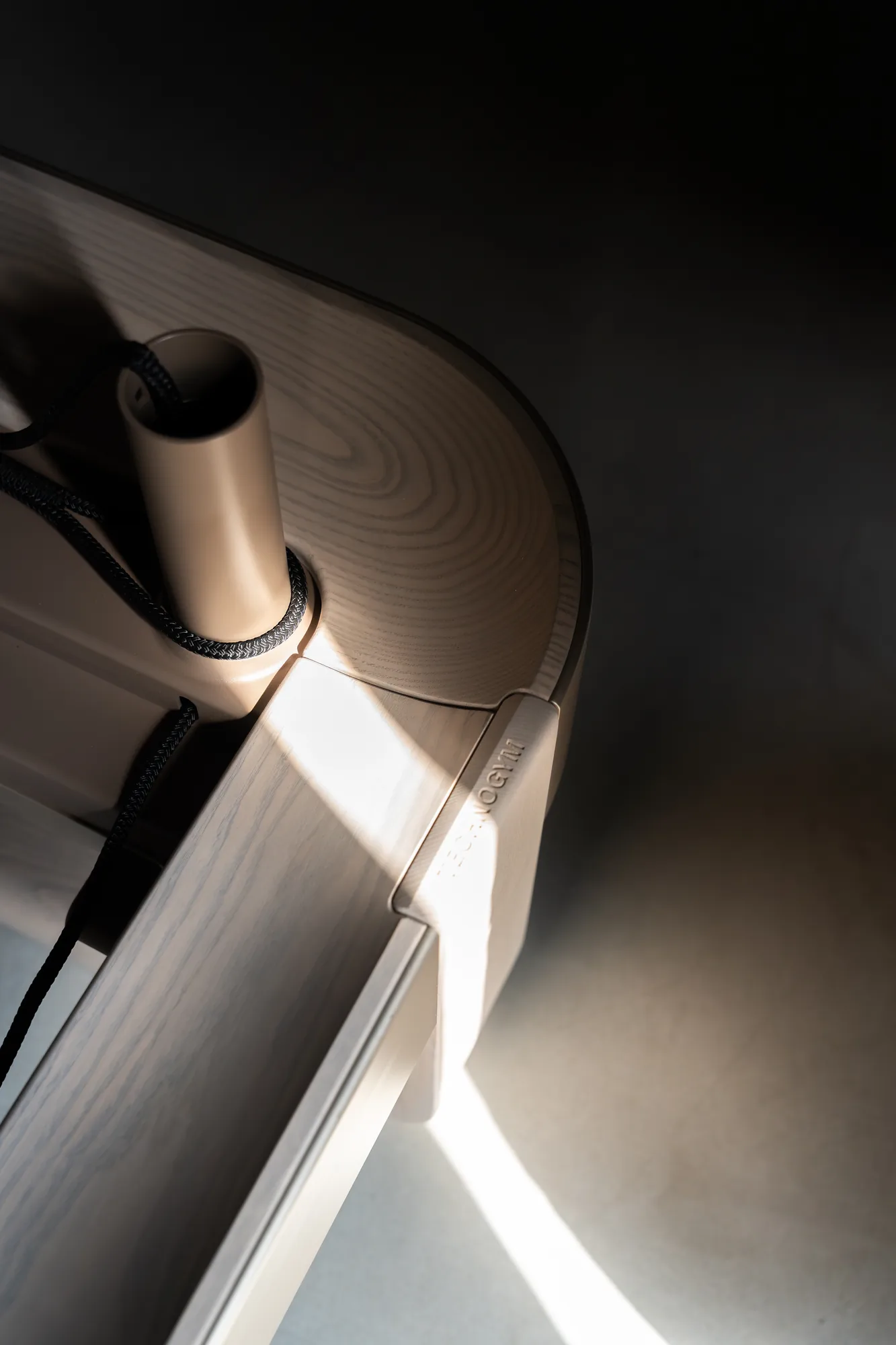 Detail of a wooden Technogym bench in daylight at ONE PULS